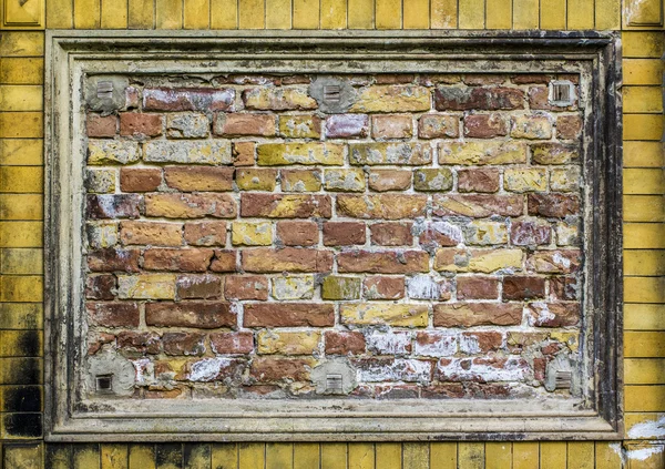 Gamla tegel vägg mönster närbild med stuckatur ram — Stockfoto