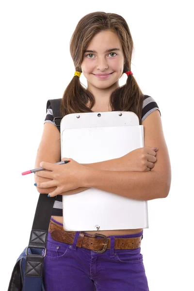 クリップボードと笑みを浮かべて、聖霊降臨祭に分離された鉛筆で 10 代の少女 — ストック写真