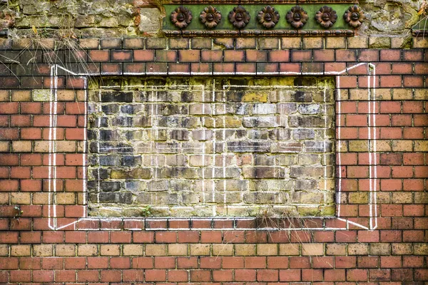 drawn window on an old brick wall