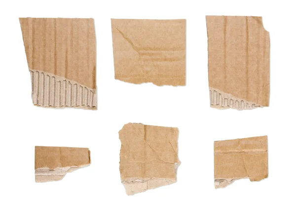 Collection of ripped brown pieces of cardboard isolated on whit — Stock Photo, Image