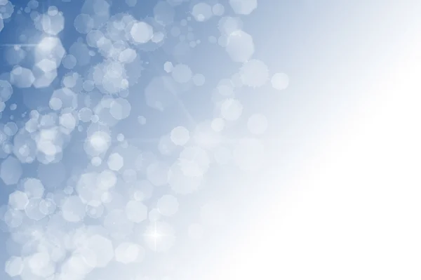 mavi arka plan beyaz bokeh yıldızlar parıldıyor