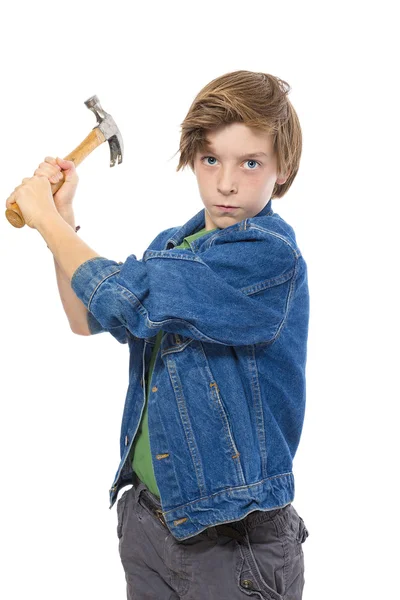 Teenage boy holding a hammer ready to hit, isolated on white — Stock Photo, Image