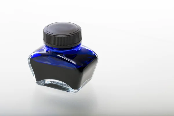 Single blue glass ink pot, isolated on white — Stock Photo, Image