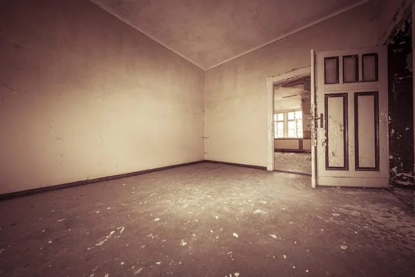 Fish eye shoot of a empty dirty room with sepia color filter — Stock Photo, Image