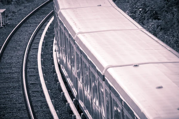 Detail of a moving train, vintage color filter — Stock Photo, Image