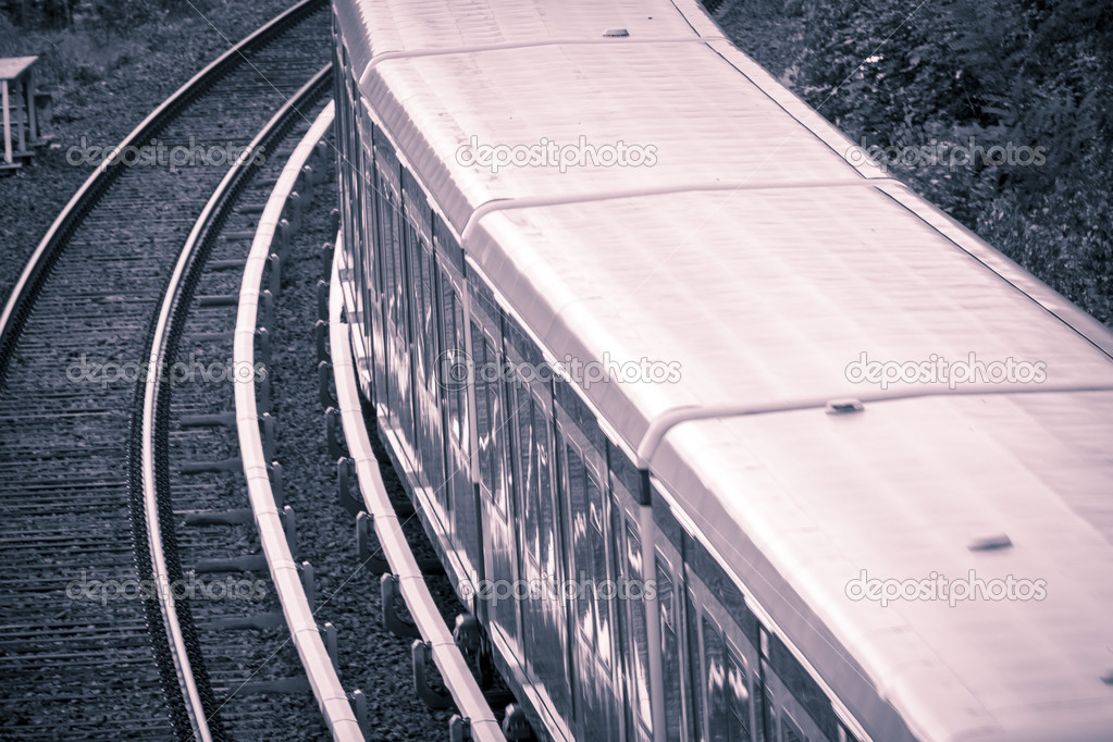 detail of a moving train, vintage color filter