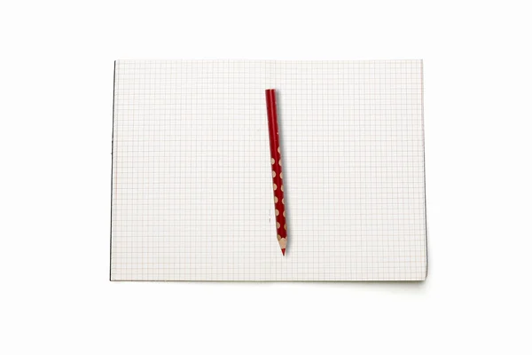 Öppna kvadraten Tom bok med röd penna, isolerad på vit — Stockfoto