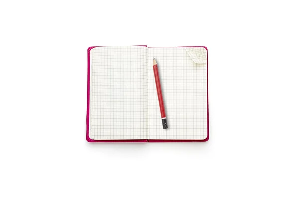 Journal ouvert blanc rose avec crayon rouge, isolé sur blanc — Photo