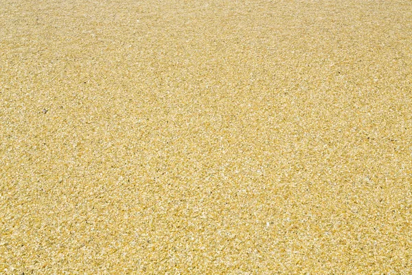 Крупным планом мокрый пляжный песок для фона — стоковое фото