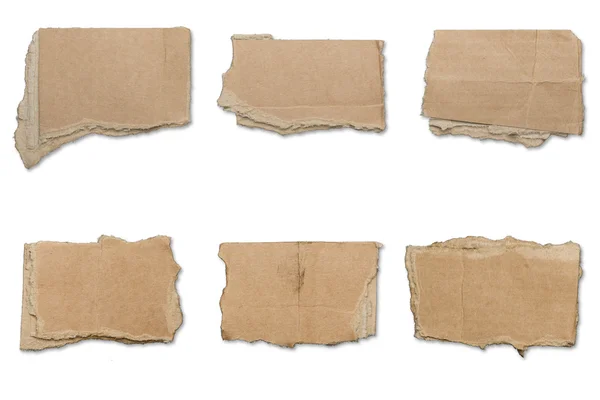 Collection of ripped  brown pieces of cardboard, shadows, isolat — Stock Photo, Image