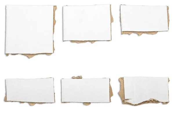 Collection of ripped  white pieces of cardboard, shadows, isolat — Stock Photo, Image