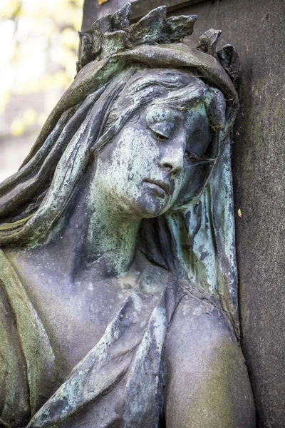 Bronze sculpture of a sad woman — Stock Photo, Image