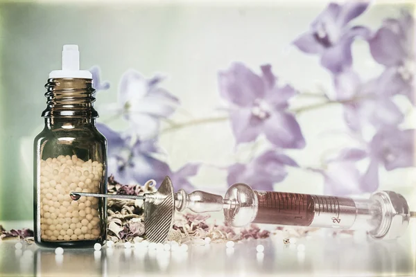 Vintage still life with homeopathy globule, syringe with blood, — Stock Photo, Image