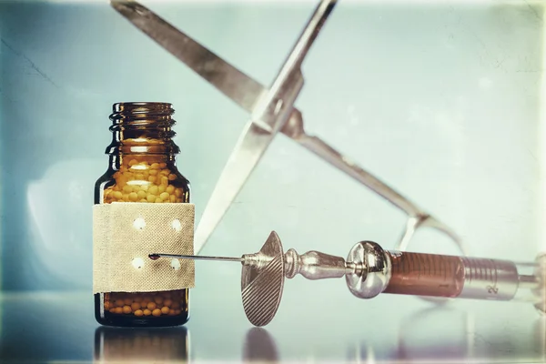 Vintage still life with homeopathy globules. syringe with blood, — Stock Photo, Image