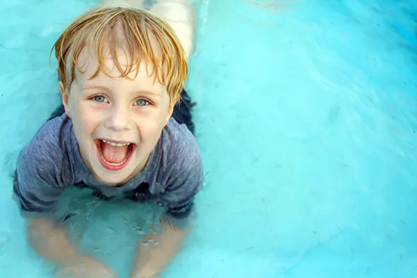 Smiling Child in Baby Pool — Stock Photo, Image