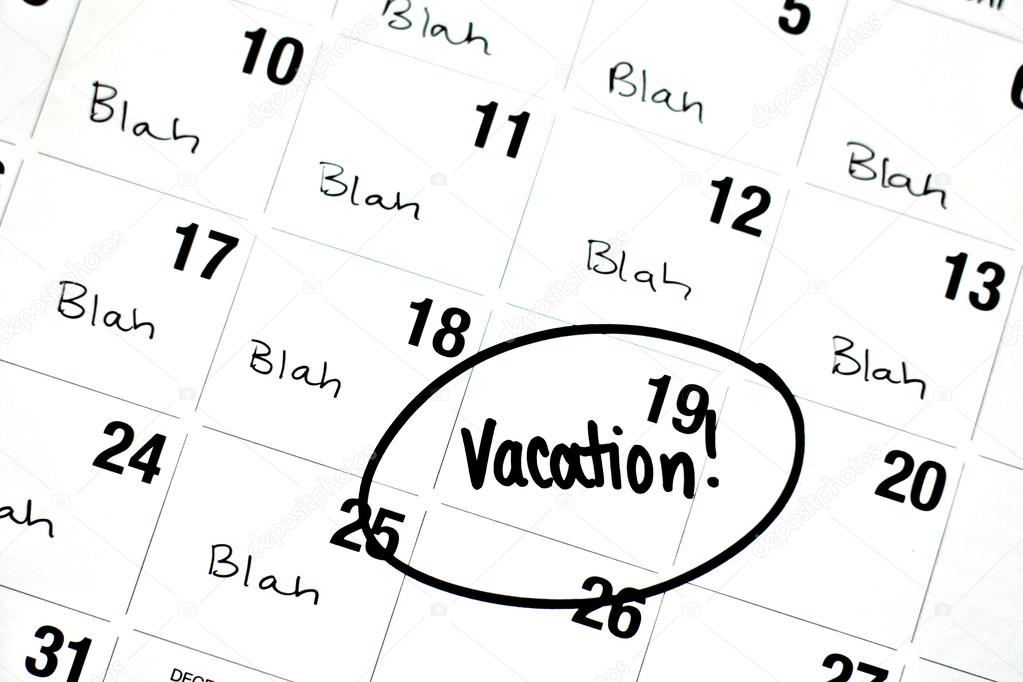 The Word Vacation is Written and Circled on a Calendar