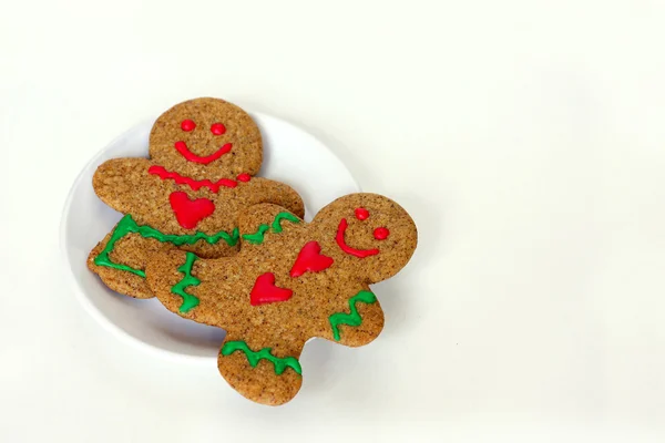 Christmas Gingerbread Man and Woman on Plate Isolated — Stock Photo, Image