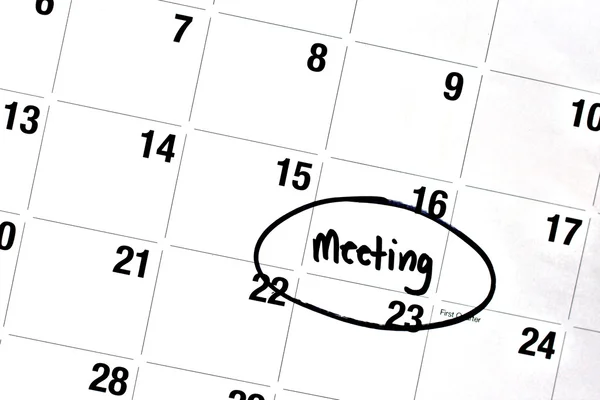 Ordet möte skriven och cirklade på kalendern — Stockfoto