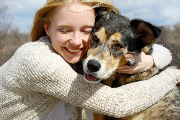 Close up of Woman Hugging German Shepherd Dog — Stock Photo, Image