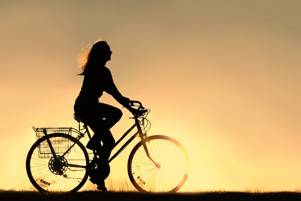 Woman Riding Bicycle Silhouette — Stock Photo, Image