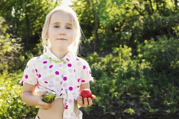 Young girl in the garden — Stock Photo, Image