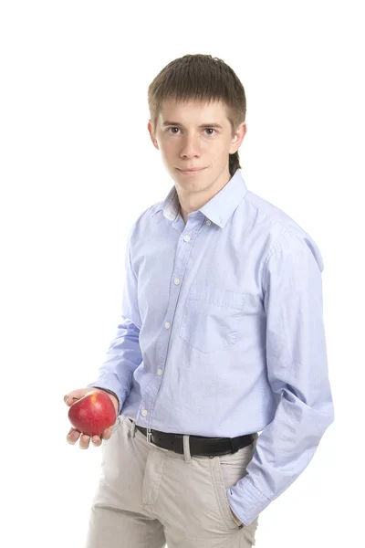 Manl drží žluté jablko — Stock fotografie