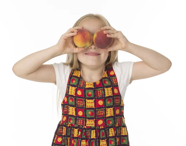 Beautifu girl with peaches — Stock Photo, Image