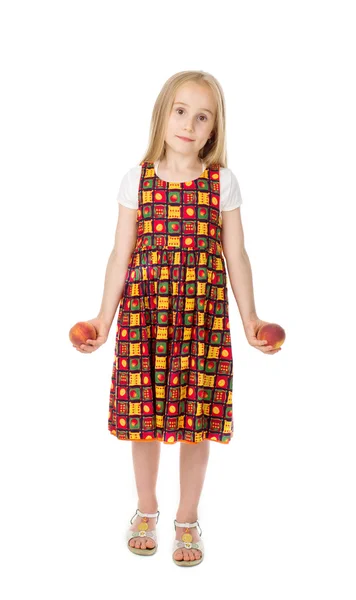 Девочка с персиками Стоковая Картинка