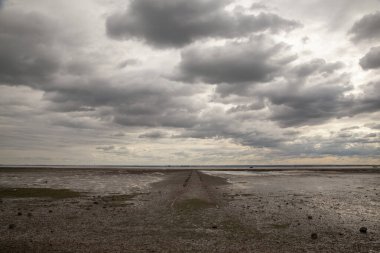 Pathway going out into the sea at Westcliff, near Southend-on-Sea, Essex, England