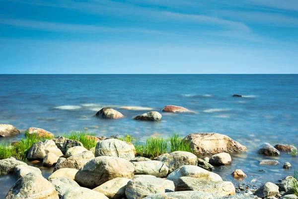 Rocks on the coastline under morning sunlight — Stock Photo, Image