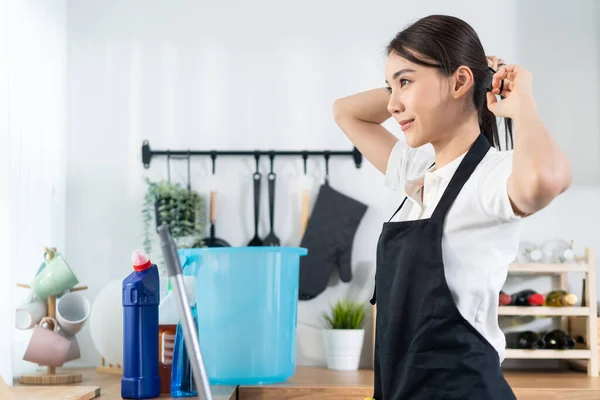 Asian Cleaning Service Woman Worker Tying Hair Doing Housework Beautiful — Zdjęcie stockowe