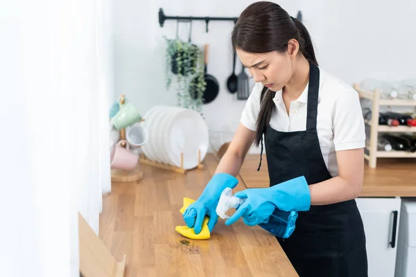 Asian Young Cleaning Service Woman Worker Clean Kitchen Table Home — Stockfoto