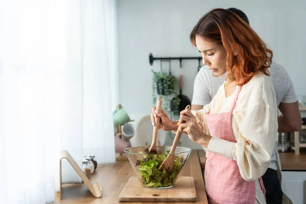 Asian Beautiful Woman Cook Green Salad Husband Kitchen Home Young — Zdjęcie stockowe