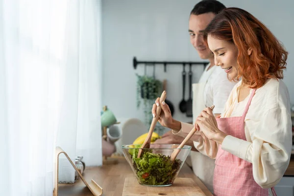 Asian Beautiful Woman Cook Green Salad Husband Kitchen Home Young — Zdjęcie stockowe
