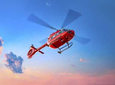 Havada kırmızı renkli helikopter var. Hava sağlık hizmeti, hava ulaşımı, hava ambulansı, hızlı şehir ulaşımı veya helikopter turları temalı harika bir fotoğraf.. 