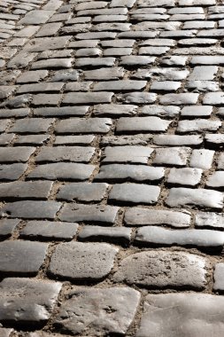 Ortaçağ kaldırım taşı yolunun arka planı.