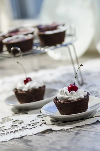 Chocolate dessert decorated with cherry — Stock Photo, Image