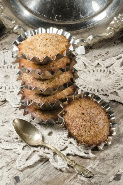 Pumpkin muffins on table and old golden spoon — Stock Photo, Image