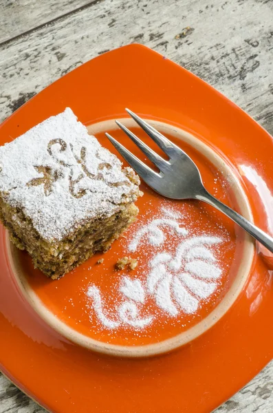 Torta di zucca su piatto arancione e forchetta — Foto Stock