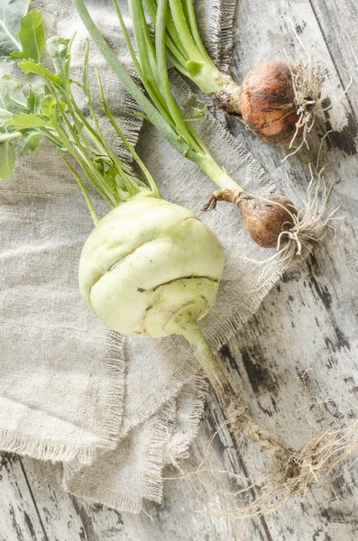 Fresh vegetables on old wooden table — Stock Photo, Image