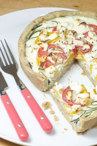 Ready vegetable pie on wooden cutting board — Stock Photo, Image