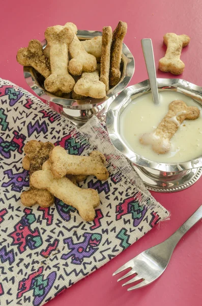 Bone sugar cookies and condensed milk, selective focus — Stock Photo, Image