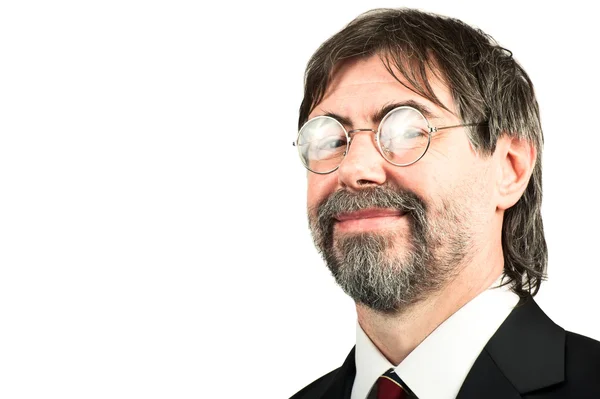 Portrait of a senior businessman smiling — Stock Photo, Image