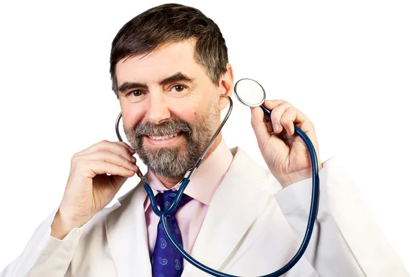 Portrait of happy middle-aged doctor with a stethoscope listenin — Stock Photo, Image