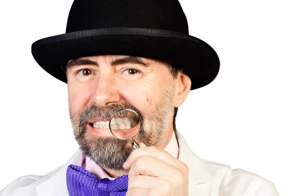 Portrait of happy middle-aged man in a hat with a monocle in his — Stock Photo, Image