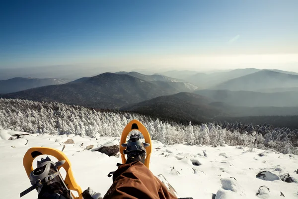 Hiker in winter mountains snowshoeing — Stock Photo, Image