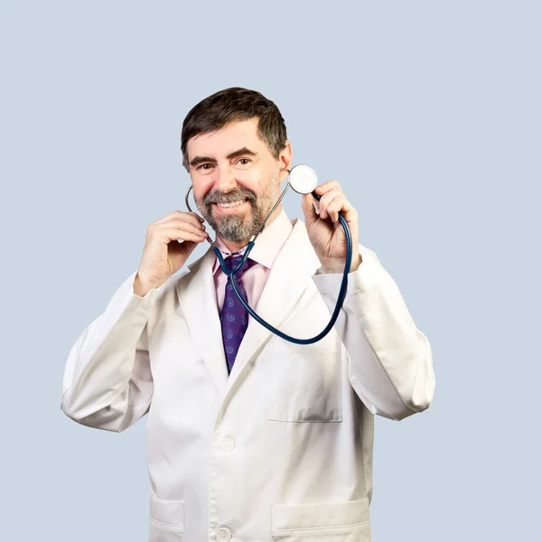 Doctor with a stethoscope listening — Stock Photo, Image