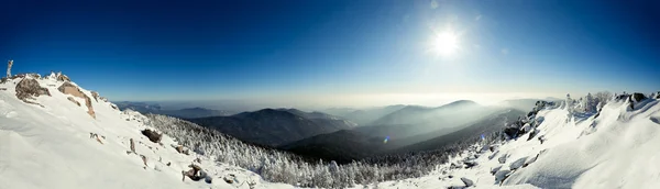Panorama of snow mountain landscape with blue sky — Stock Photo, Image