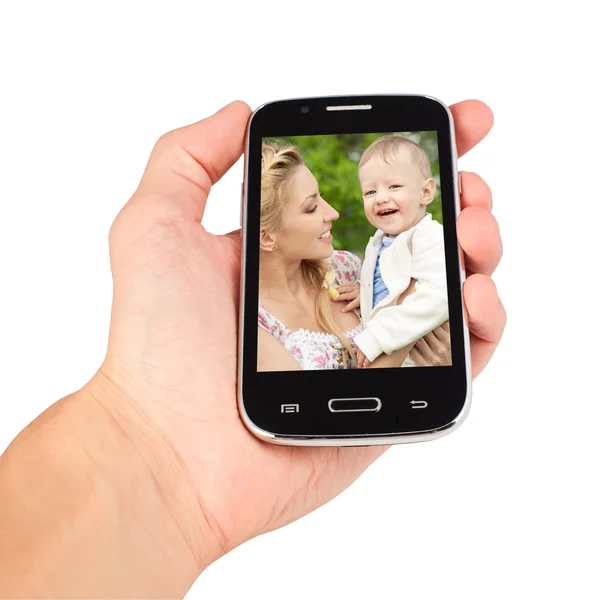 Mão a segurar o telefone inteligente, família a ligar. isolado nas costas brancas — Fotografia de Stock