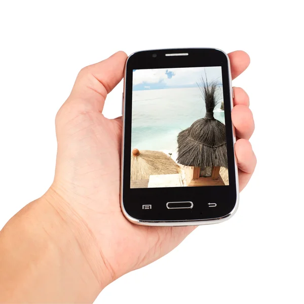 Hand holding smart phone, holidays calling. isolated on white ba — Stock Photo, Image